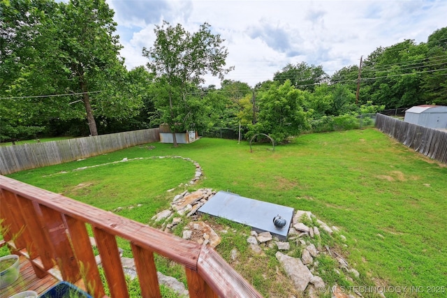 3104 Howard St, Sand Springs, OK 74063 - fenced backyard featuring a storage shed