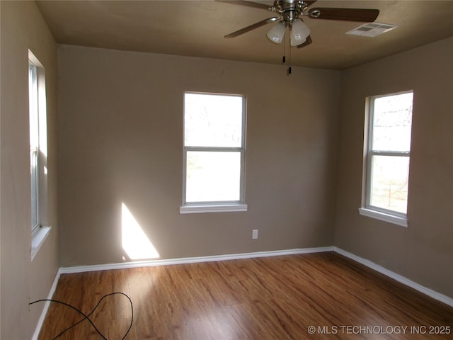 2131 Topeka St, Muskogee, OK 74403 - empty room featuring wood finished floors and a ceiling fan
