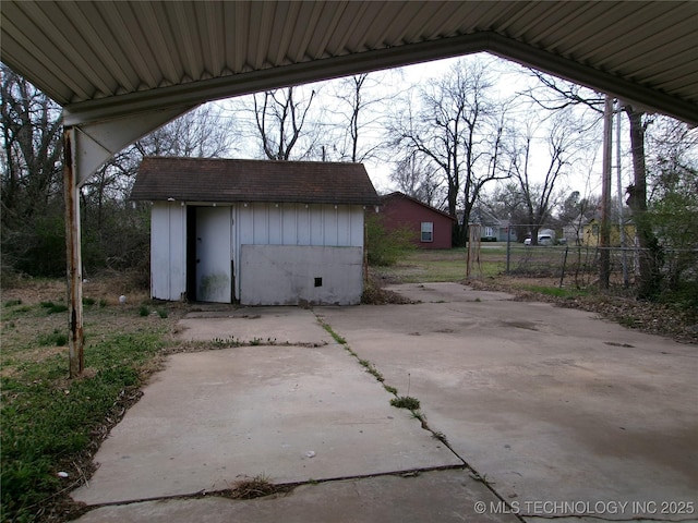 2131 Topeka St, Muskogee, OK 74403 - garage featuring a storage shed