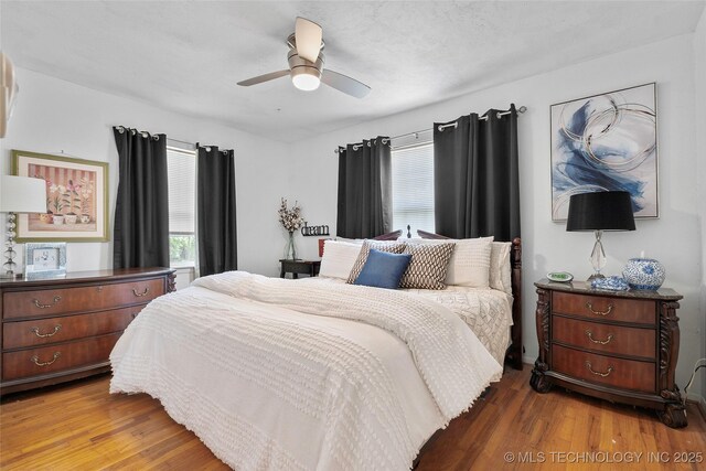 4080 Bud Dr, Sulphur, OK 73086 - bedroom with wood finished floors and ceiling fan