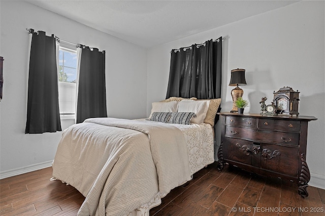 4080 Bud Dr, Sulphur, OK 73086 - bedroom featuring dark wood-style floors