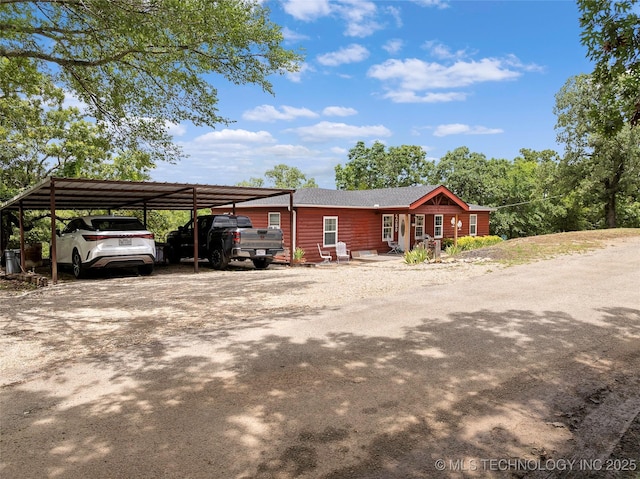4080 Bud Dr, Sulphur, OK 73086 - view of home's exterior with a detached carport and driveway