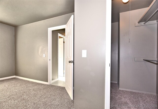 10046 E 29th St, Tulsa, OK 74129 - interior space featuring light carpet and baseboards