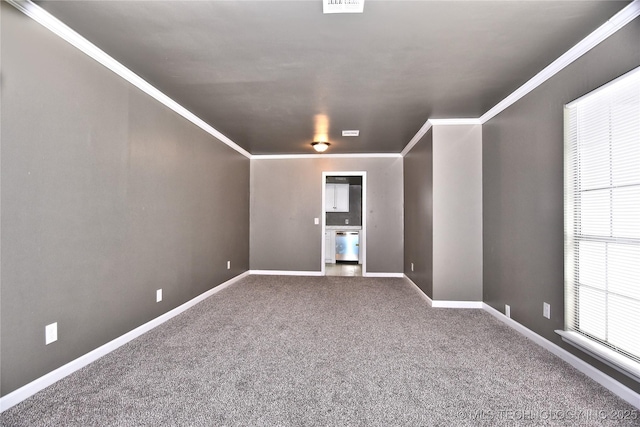 10046 E 29th St, Tulsa, OK 74129 - carpeted spare room with crown molding