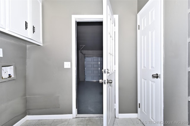 10046 E 29th St, Tulsa, OK 74129 - laundry area with hookup for a washing machine and cabinet space