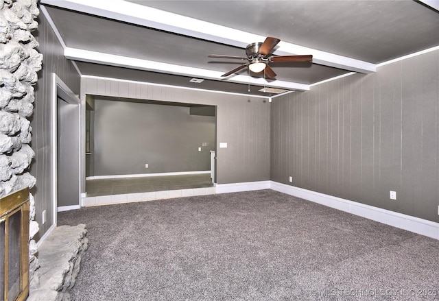 10046 E 29th St, Tulsa, OK 74129 - cinema featuring a ceiling fan, carpet floors, beamed ceiling, and a fireplace