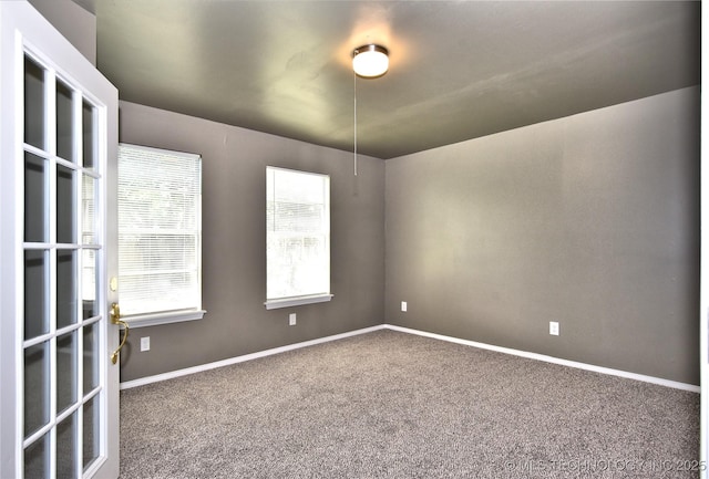 10046 E 29th St, Tulsa, OK 74129 - unfurnished room with carpet floors and baseboards