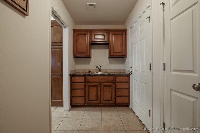 9904 N 102nd E Ave, Owasso, OK 74055 - bar area with a sink and light tile patterned flooring