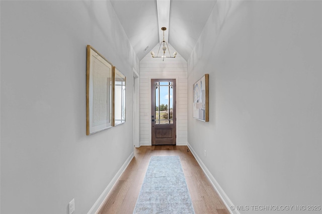 9613 E 119th Ct S, Bixby, OK 74008 - doorway featuring light wood-type flooring and vaulted ceiling