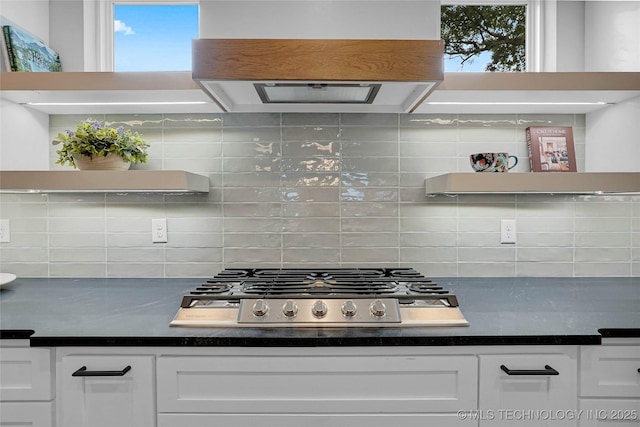 9613 E 119th Ct S, Bixby, OK 74008 - kitchen featuring exhaust hood, open shelves, stainless steel gas cooktop, and white cabinetry