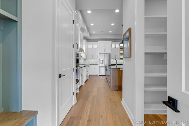 9613 E 119th Ct S, Bixby, OK 74008 - corridor with recessed lighting and light wood-style floors