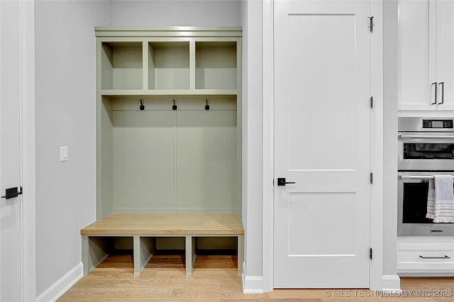 9613 E 119th Ct S, Bixby, OK 74008 - mudroom with light wood finished floors and baseboards