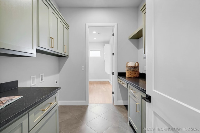 9613 E 119th Ct S, Bixby, OK 74008 - kitchen featuring light tile patterned flooring, recessed lighting, open shelves, and dark stone countertops