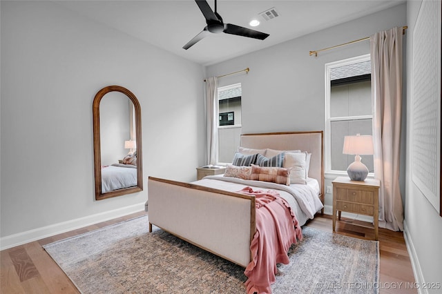 9613 E 119th Ct S, Bixby, OK 74008 - bedroom with wood finished floors, a ceiling fan, and recessed lighting