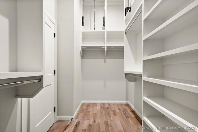 13236 E 4th Pl, Tulsa, OK 74108 - spacious closet with light wood finished floors