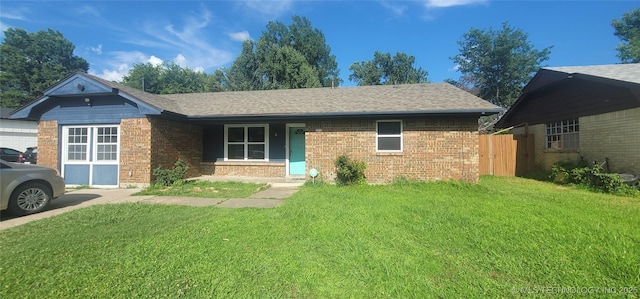 3315 S 116th E Pl, Tulsa, OK 74146 - ranch-style house featuring brick siding and roof with shingles