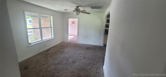 3315 S 116th E Pl, Tulsa, OK 74146 - carpeted spare room with plenty of natural light, arched walkways, and ceiling fan
