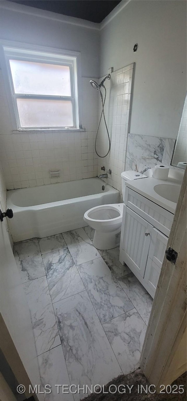 3315 S 116th E Pl, Tulsa, OK 74146 - full bathroom with marble look tile flooring, vanity, and bathing tub / shower combination