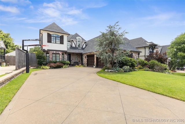 1536 E 35th Pl, Tulsa, OK 74105 - view of front of home featuring driveway, a garage, and roof with shingles