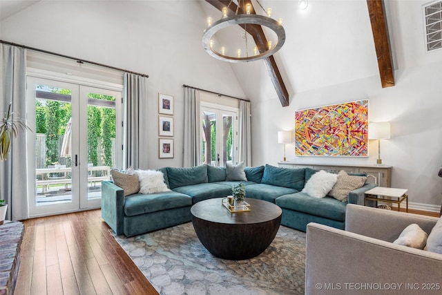 1536 E 35th Pl, Tulsa, OK 74105 - living area featuring a chandelier, high vaulted ceiling, wood-type flooring, healthy amount of natural light, and beam ceiling