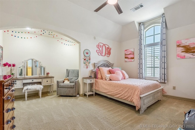 1536 E 35th Pl, Tulsa, OK 74105 - bedroom with carpet flooring, lofted ceiling, ceiling fan, and arched walkways