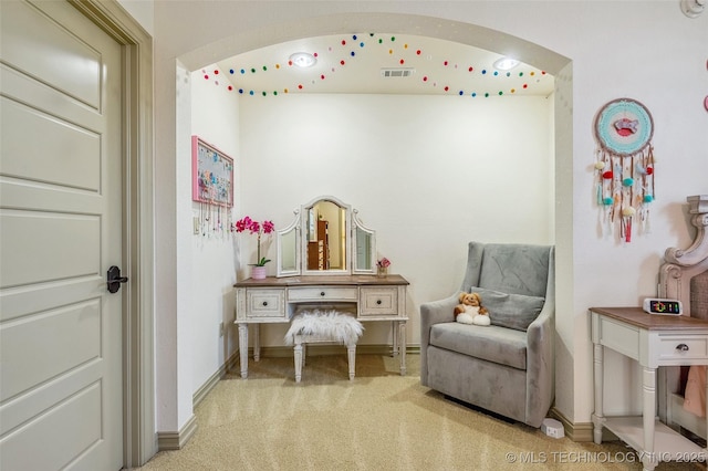 1536 E 35th Pl, Tulsa, OK 74105 - living area featuring light colored carpet and arched walkways