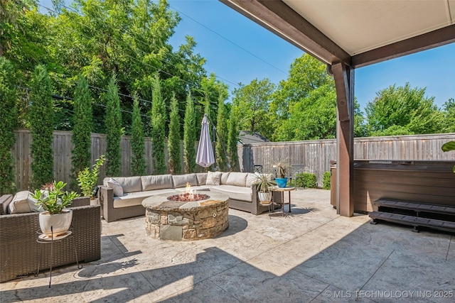 1536 E 35th Pl, Tulsa, OK 74105 - fenced backyard featuring an outdoor living space with a fire pit and a patio area