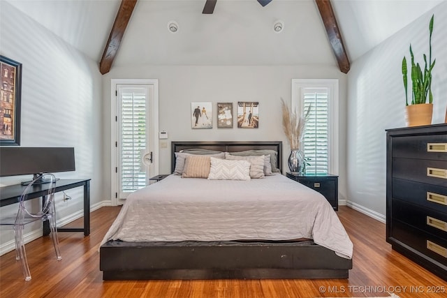 1536 E 35th Pl, Tulsa, OK 74105 - bedroom with wood finished floors, ceiling fan, and access to exterior