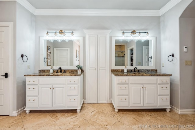 1536 E 35th Pl, Tulsa, OK 74105 - bathroom featuring two vanities, ornamental molding, and tile patterned floors