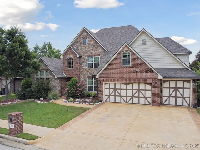 12225 S Glen Ct, Jenks, OK 74037 - view of front of property with a front yard, driveway, a shingled roof, brick siding, and a garage
