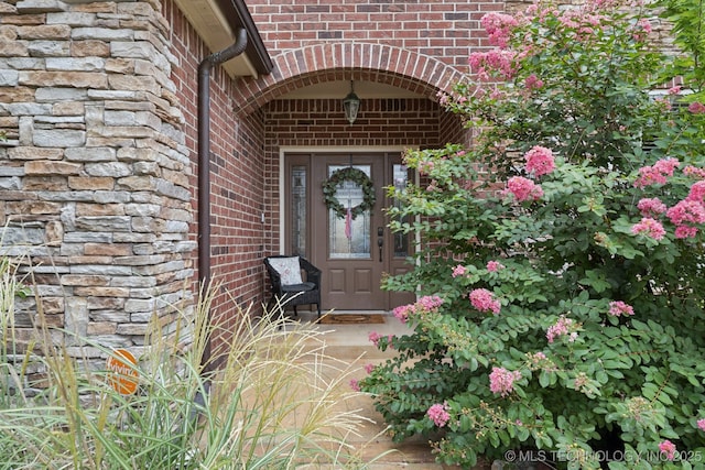 12225 S Glen Ct, Jenks, OK 74037 - view of exterior entry with brick siding