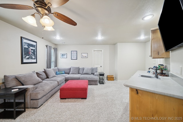 12225 S Glen Ct, Jenks, OK 74037 - carpeted living area with ceiling fan and recessed lighting