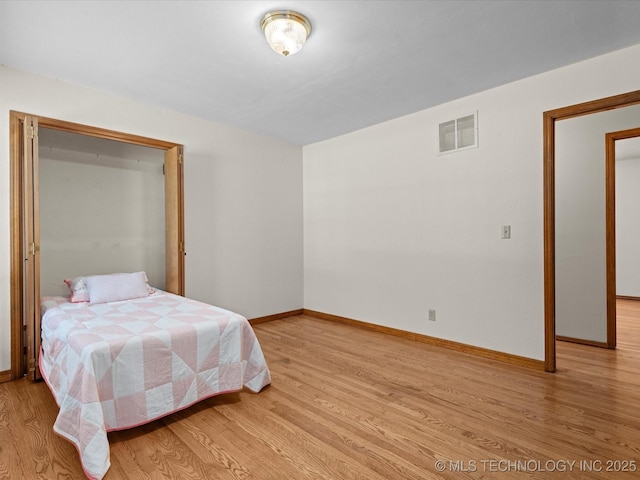 3321 Woodland Rd, Bartlesville, OK 74006 - bedroom featuring light wood-style floors