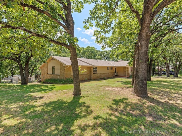 3321 Woodland Rd, Bartlesville, OK 74006 - view of front of home with stone siding