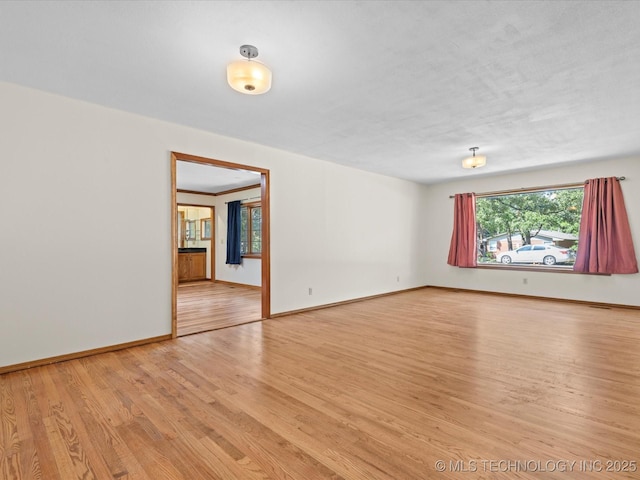 3321 Woodland Rd, Bartlesville, OK 74006 - unfurnished room featuring light wood-style flooring