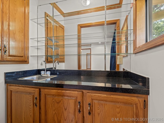3321 Woodland Rd, Bartlesville, OK 74006 - kitchen with a sink and brown cabinets