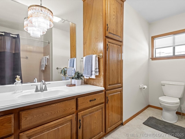 3321 Woodland Rd, Bartlesville, OK 74006 - full bathroom featuring vanity, a chandelier, and a shower with shower curtain