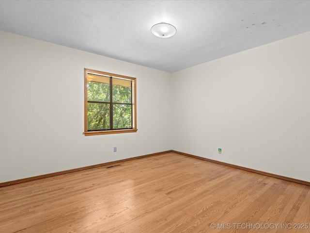 3321 Woodland Rd, Bartlesville, OK 74006 - unfurnished room with light wood-style flooring