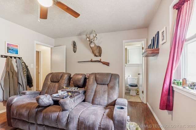 13201 W 86th St S, Sapulpa, OK 74066 - living area featuring ceiling fan, wood finished floors, and a textured ceiling