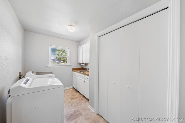 1377 S Wortman Ave, Claremore, OK 74017 - laundry room featuring washing machine and clothes dryer and cabinet space