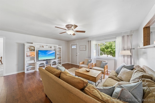 1377 S Wortman Ave, Claremore, OK 74017 - living area featuring a ceiling fan and dark wood-style floors
