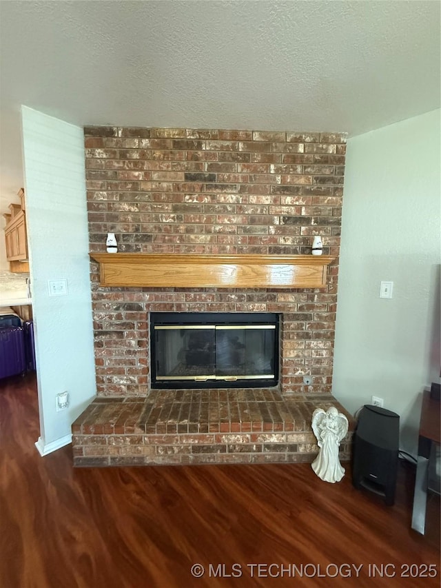 4001 Chaucer, Muskogee, OK 74403 - detailed view of a fireplace, wood finished floors, and a textured ceiling