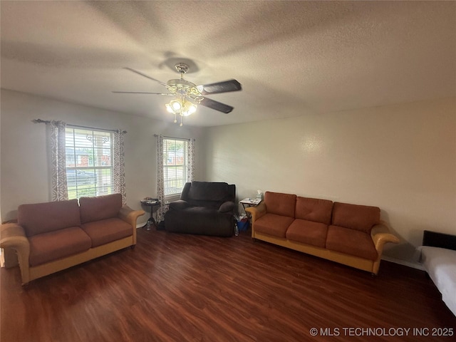 4001 Chaucer, Muskogee, OK 74403 - living room featuring wood finished floors, a ceiling fan, and a textured ceiling