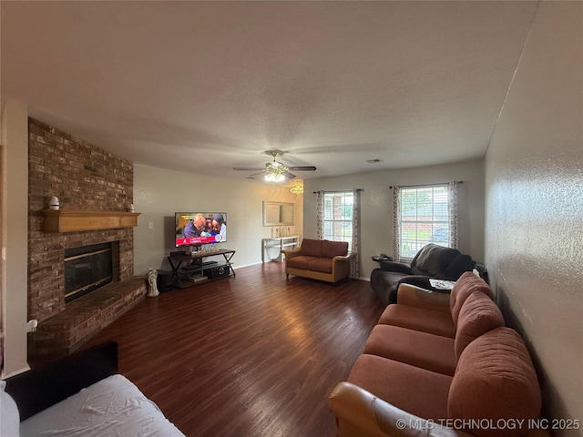 4001 Chaucer, Muskogee, OK 74403 - living area featuring wood finished floors, a brick fireplace, and ceiling fan