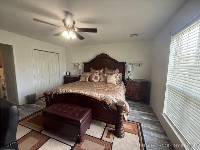 4001 Chaucer, Muskogee, OK 74403 - bedroom featuring wood finished floors, a ceiling fan, and a closet