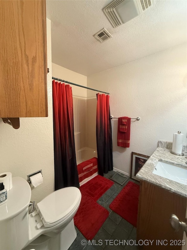 4001 Chaucer, Muskogee, OK 74403 - full bath with vanity, a textured ceiling, a textured wall, and tile patterned floors