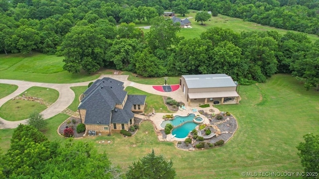 3892 Folsom Rd, Durant, OK 74701 - view of subject property with a pool and a forest