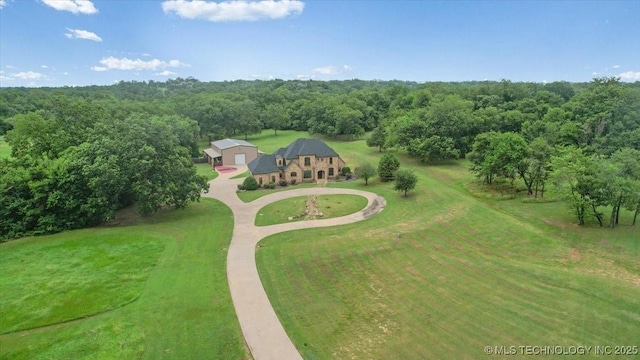 3892 Folsom Rd, Durant, OK 74701 - aerial view of property and surrounding area with a forest