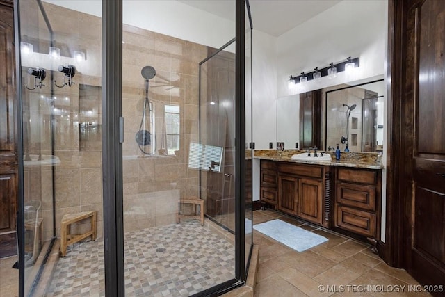 3892 Folsom Rd, Durant, OK 74701 - bathroom with vanity, a stall shower, and tile patterned floors