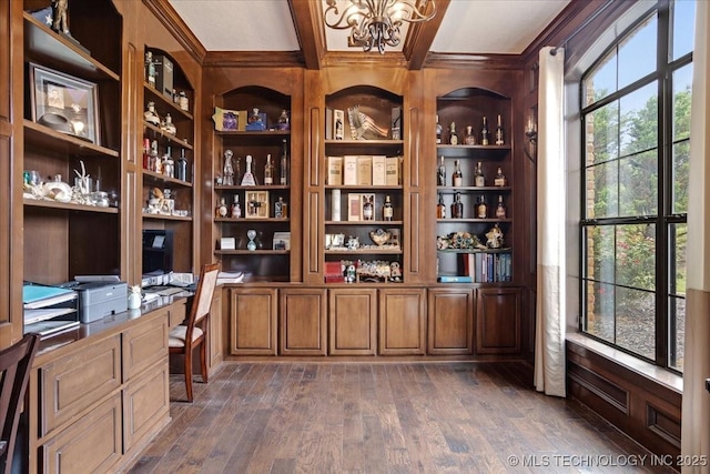 3892 Folsom Rd, Durant, OK 74701 - office space featuring built in study area, a chandelier, coffered ceiling, dark wood-type flooring, and crown molding